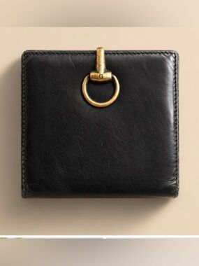 Gucci Black Leather Bifold Wallet with Gold Ring Accent